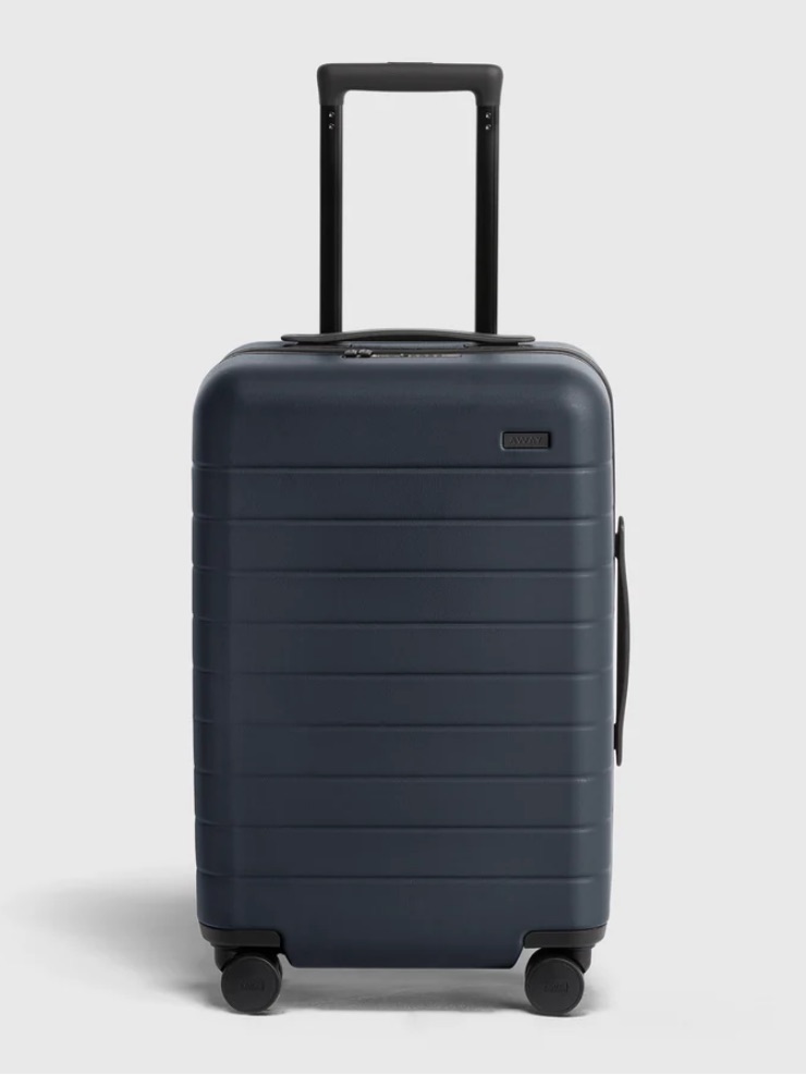 Away The Medium Flex 4 Wheel Carry-On Suitcase In Navy Blue